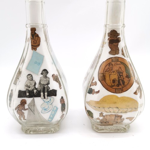 199 - Pair of glass decanters with decoupage / salt detail to the interior - 33.5cm high