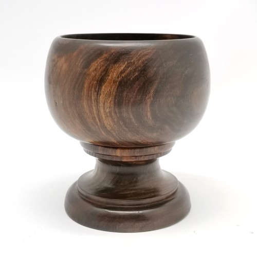 215 - Carved lignum vitae vessel - 11.5cm high x 8.6cm diameter top