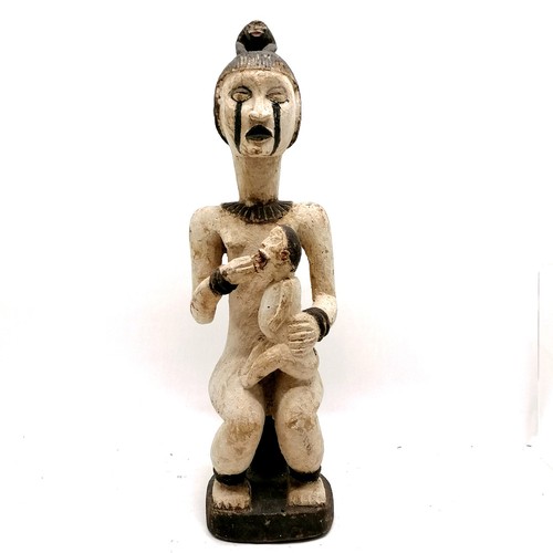 224 - Tribal hand carved wooden figure of a female figure with animal figure on head feeding a baby - 62cm... 