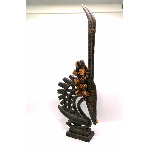 225 - Chiwara tribal headdress in the form of an antelope mounted on wooden stand - 101cm high