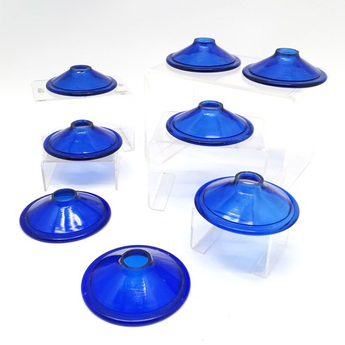 238 - 8 x blue glass candle drip catchers - 11.4cm diameter (centre 2.5cm diameter)