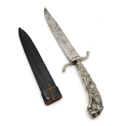 252 - Dagger with tiger pommel & 'ↄsc/☆' marks to blade and in a sheath - total length 30.5cm