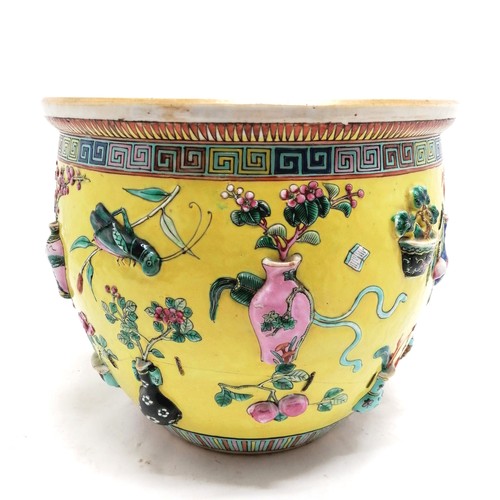 15 - 19thC yellow-ground Famille-Rose moulded fish bowl decorated with the Hundred Antiques the interior ... 