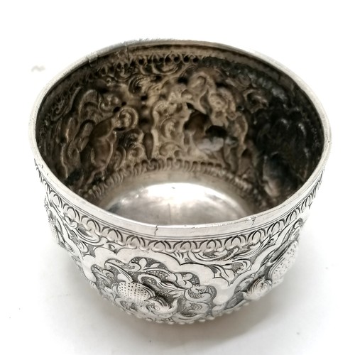 24 - Antique Shan Burmese silver bowl decorated with embossed mythical animal decoration 65g 7.5cm diamet... 