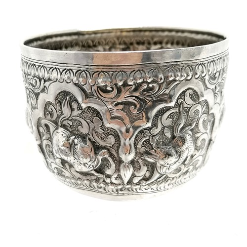 24 - Antique Shan Burmese silver bowl decorated with embossed mythical animal decoration 65g 7.5cm diamet... 