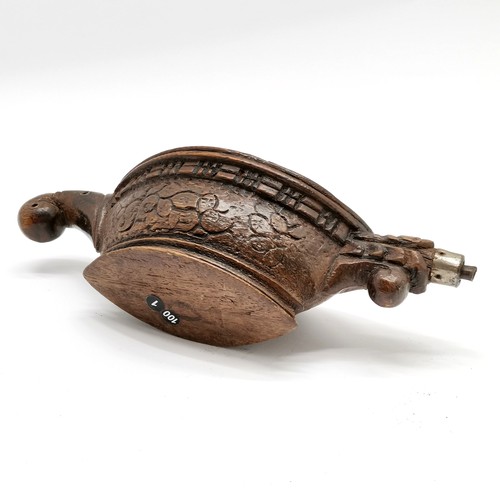 67 - Indian hand carved wooden oil lamp with metal spout - 24cm across