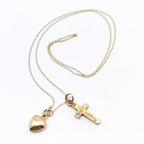 538 - 9ct gold hallmarked cross pendant, unmarked gold heart pendant on a fine 9ct gold marked chain 40cm ... 