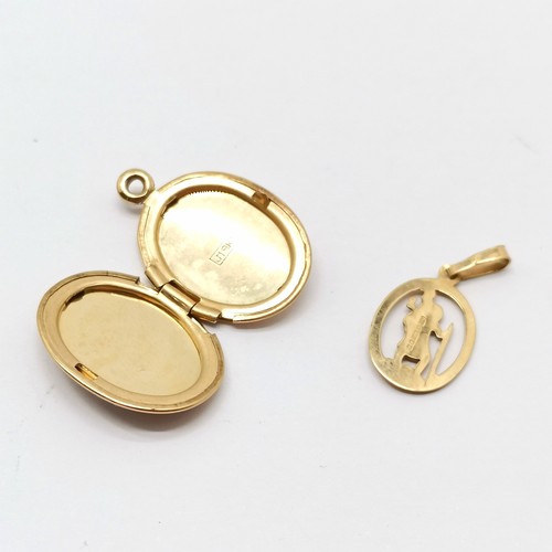 543 - 9ct marked gold locket (total drop 2.4cm) & St Christopher pendant - total weight (2) 2.6g