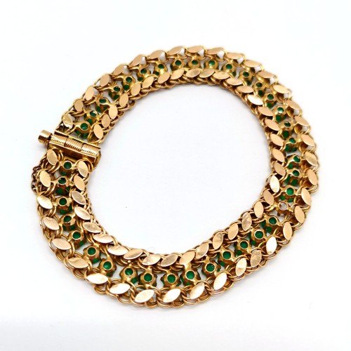 551 - Foreign marked 14ct gold bracelet set with green stones (emeralds?) - approx 16cm & 9.5g total weigh... 