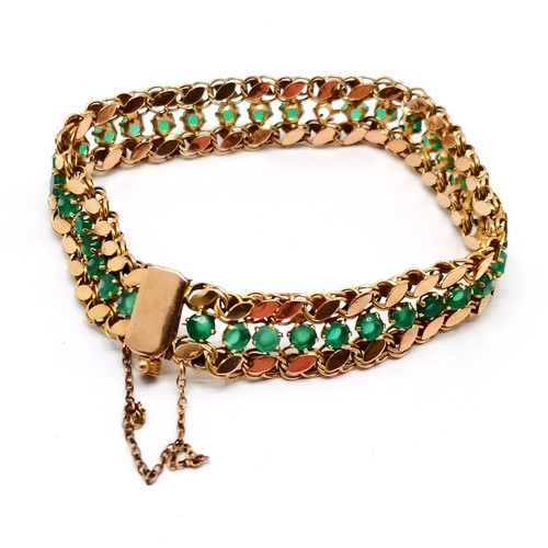 551 - Foreign marked 14ct gold bracelet set with green stones (emeralds?) - approx 16cm & 9.5g total weigh... 