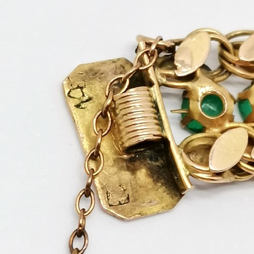 551 - Foreign marked 14ct gold bracelet set with green stones (emeralds?) - approx 16cm & 9.5g total weigh... 