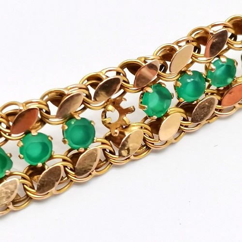 551 - Foreign marked 14ct gold bracelet set with green stones (emeralds?) - approx 16cm & 9.5g total weigh... 