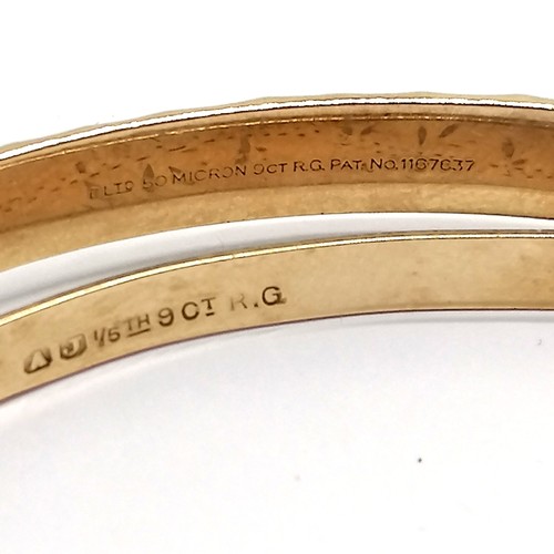 557 - 2 bangles (1 is 1/5th 9ct rolled gold and has dedication, 50 micron 9ct rolled gold engraved bangle ... 