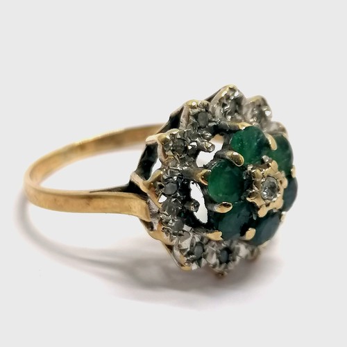 559 - 9ct hallmarked gold emerald & diamond cluster ring - size K & 2.3g total weight