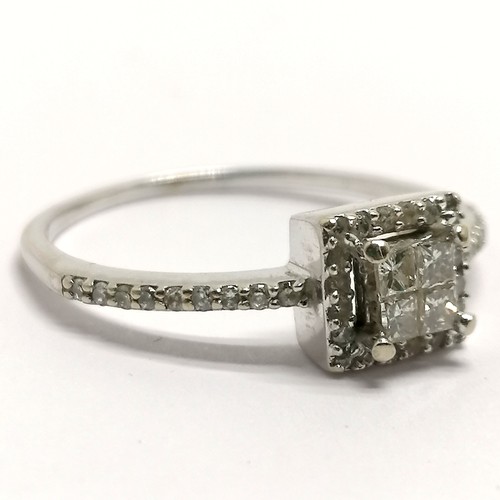 560 - 14ct marked white gold diamond cluster and diamond set shoulders - size P½ & 2g total weight