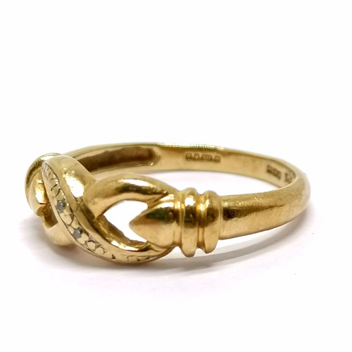 594 - 9ct hallmarked gold knot design ring set with diamonds - size L½ & 2g total weight - SOLD ON BEHALF ... 