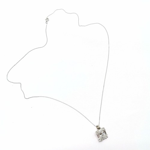 639 - 9ct marked white gold CZ pendant on a 9ct white gold 44cm neckchain - 1.6g total weight