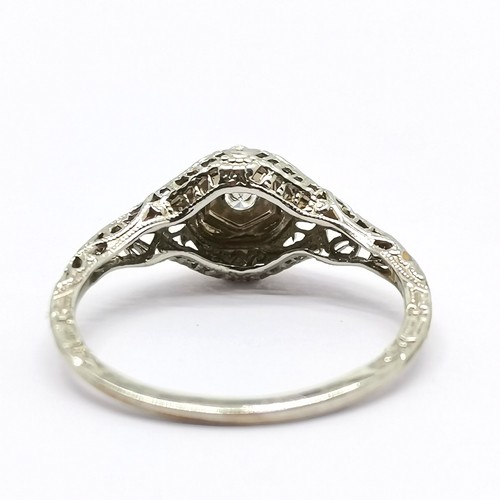 666 - 18ct marked white gold diamond set ring with hexagonal detail & fancy setting & shoulders - size M½ ... 