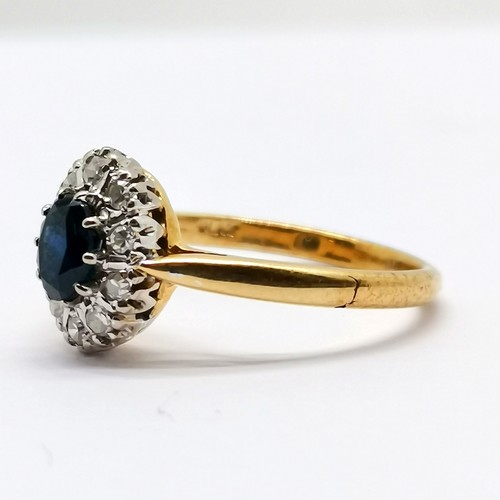 670 - 18ct marked gold & platinum sapphire & diamond oval cluster ring - size N & 3.2g total weight