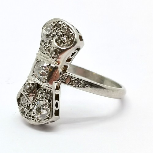 672 - Platinum marked Art Deco unusual diamond set ring with diamond set shoulders - size N & 8g total wei... 