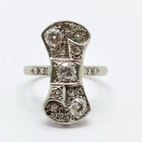 672 - Platinum marked Art Deco unusual diamond set ring with diamond set shoulders - size N & 8g total wei... 