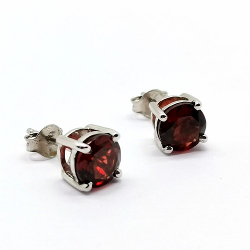 701 - Silver garnet set stud earrings