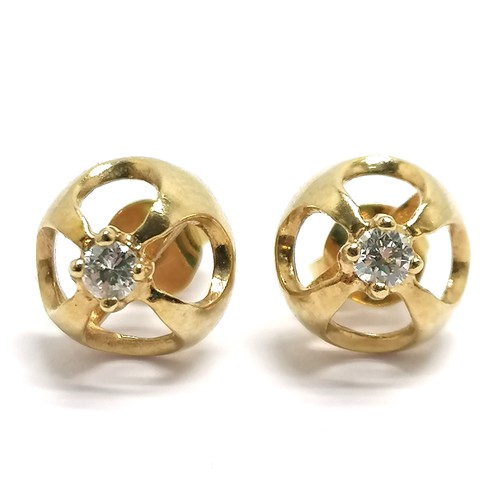 704 - 9ct hallmarked gold pair of diamond set earrings - approx 9mm diameter & 2.2g total weight