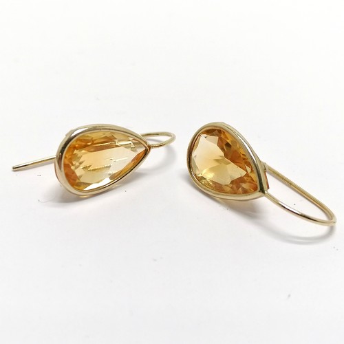 707 - 10ct marked gold citrine pear shaped stone drop earrings - 2cm drop & 2.8g total weight