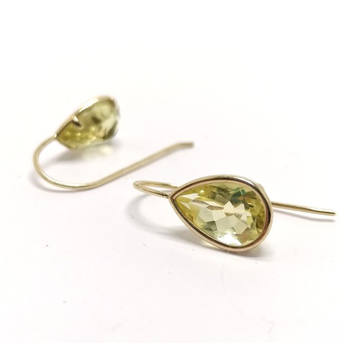 709 - 10ct marked gold peridot pear shaped stone set drop earrings - 2cm drop & 2g total weight