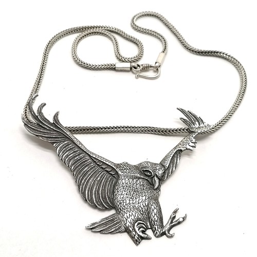 725 - Silver 925 marked swooping eagle pendant on silver 46cm chain - pendant 8.5cm across ~ total weight ... 