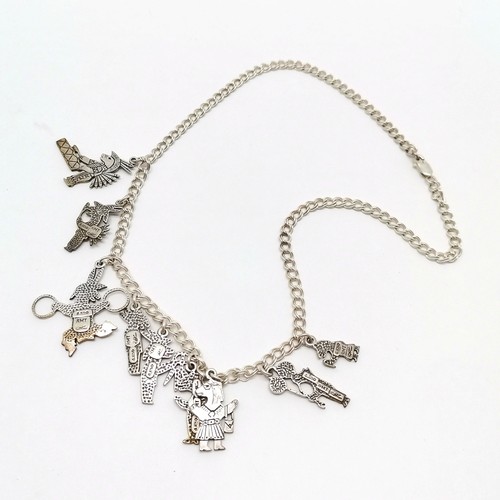 728 - Roderick Tenorio silver spirit of the carnival charm necklace - 42cm & 32g