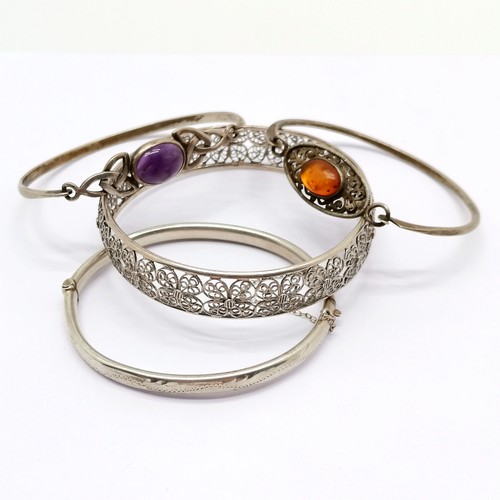 734 - 4 x silver bangles inc amber, amethyst, filigree (7cm diameter & unmarked) etc - total weight 40g