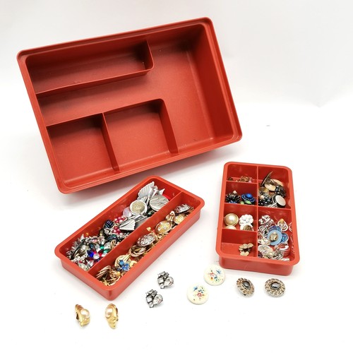 754 - Tupperware tub of mostly clip-on costume earrings inc some odd