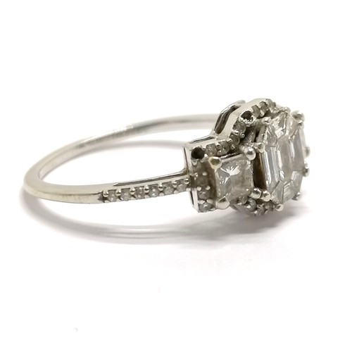 771 - 14ct marked white gold fancy diamond cluster ring ~ octagonal centre diamond with 8 x trapeze diamon... 