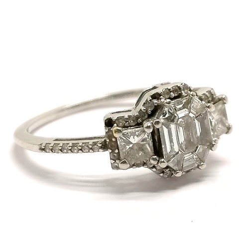 771 - 14ct marked white gold fancy diamond cluster ring ~ octagonal centre diamond with 8 x trapeze diamon... 