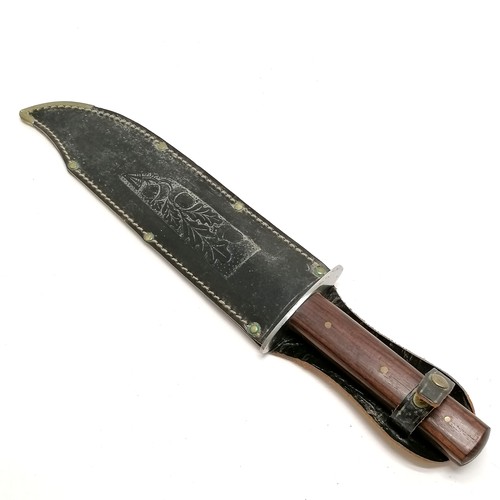 109 - Original Bowie knife with wooden detail handle (37cm) with original black leather sheath