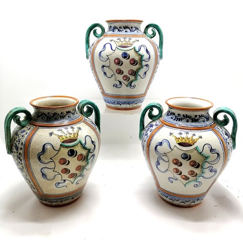 163 - Set of three majolica Medici vases 28cm high. One has a repaired handle all have crazing, otherwise ... 