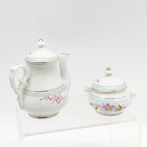 225 - Antique complete childs china tea set with hand painted floral detail - teapot 9cm high - 1 plate ha... 