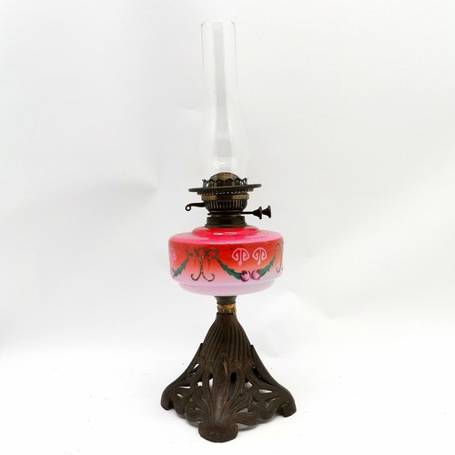 234 - Antique Art Nouveau oil lamp with cast metal base and coloured glass font and original funnel shade ... 