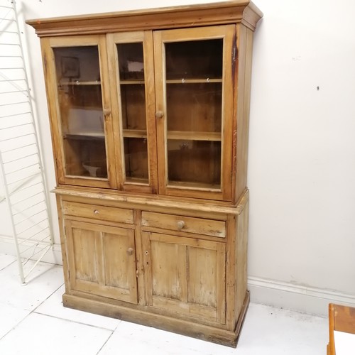 247 - Antique pine dresser with cupboard and drawer base and glazed fronted shelves to the top - 2 handles... 