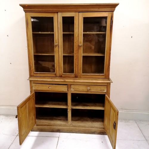 247 - Antique pine dresser with cupboard and drawer base and glazed fronted shelves to the top - 2 handles... 