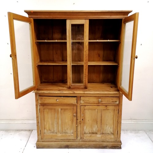 247 - Antique pine dresser with cupboard and drawer base and glazed fronted shelves to the top - 2 handles... 