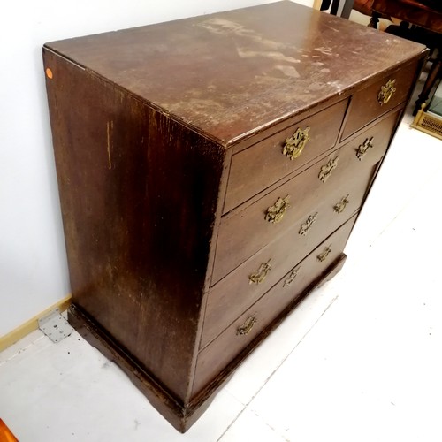 251 - Antique oak 2 over 4 chest of drawers on bracket feet - 1 handle missing and a loss to 1 top corner ... 