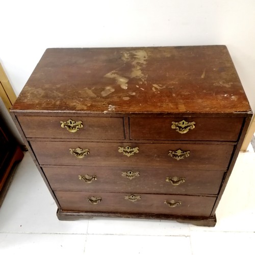 251 - Antique oak 2 over 4 chest of drawers on bracket feet - 1 handle missing and a loss to 1 top corner ... 