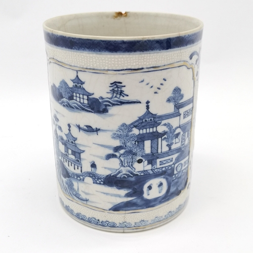 259 - Antique Chinese blue & white tankard with panelled detail - 14cm high x 11cm diameter. - chip to rim... 