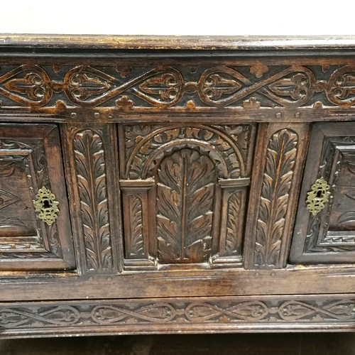 279 - Antique continental carved oak 2 door sideboard with pot board to base - 126cm long x 44.5cm deep x ... 