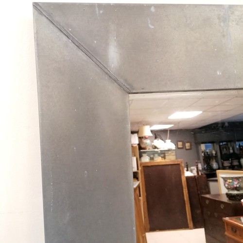 288 - Large Benchmark wall mirror with wide metal frame and Makers label to the back - in good used condit... 