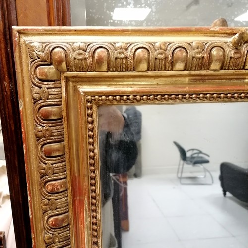 298 - Antique large carved giltwood framed overmantle mirror  - in good used condition - 105cm wide x 161c... 