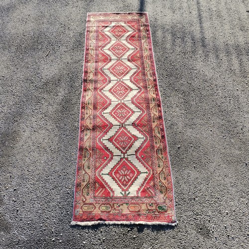 314 - Red grounded runner with diamond detail- 287cm x 81cm