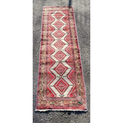 314 - Red grounded runner with diamond detail- 287cm x 81cm